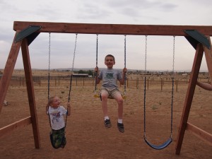 More fun on the new swing set. 